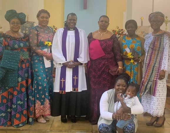 squatting with her little-one is Gisela Hammond, second from the right is Ruth Aryeetey and the third lady from the right is Lauretta Bakare. Joining them in the picture is Omoba Jackie Okarevu (Secretary), Rev Eileen Rose (Curate and Branch member) and K